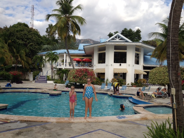 Lazy afternoons offered plenty of time to cool down at the pool! Notice the light switch and plug on the palm tree!