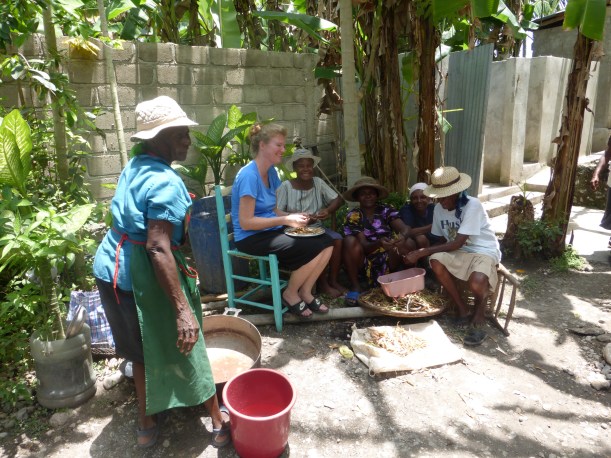 Shelling beans in the shade was such fun! You can see the outside showers and outhouses behind us.