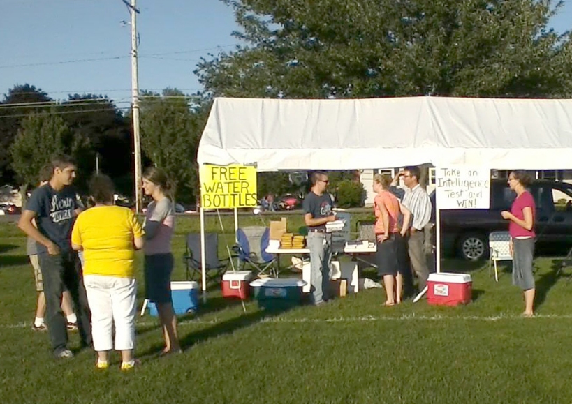 Handing out water and Bibles before the fireworks to start crucial conversations about eternity.