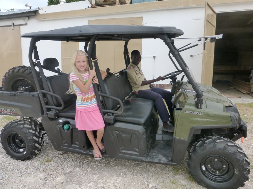 Even Lazarre, a Haitian friend, was so very excited for us. He couldn't resist sitting in it when the camera came out!