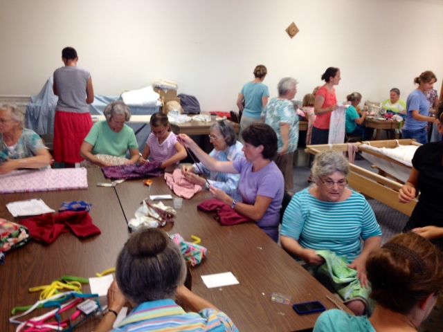 A huge evening where many came together to make pillowcase dresses for Haitian girls!