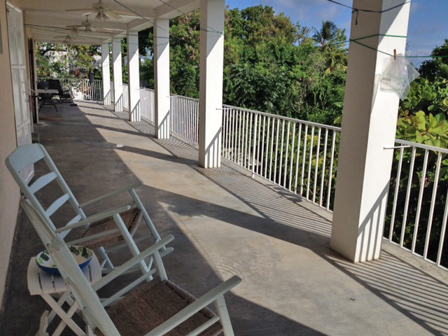 The back porch, where there is space to hang laundry or feed crowds of people!