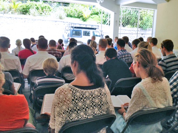We cleared out the "garage" and had English church this month! The people closest to the back are neighboring missionaries, and in front of them is part of the work team!