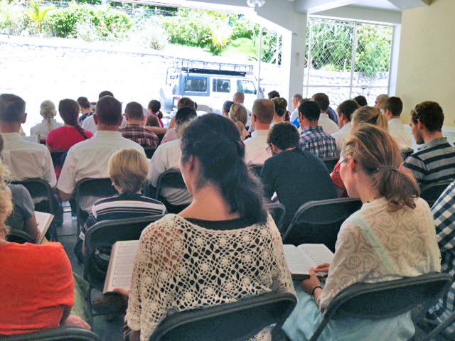 We cleared out the "garage" and had English church this month! The people closest to the back are neighboring missionaries, and in front of them is part of the work team!