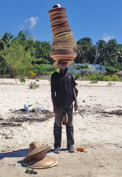 How can you resist buying a hat from this guy? Port Salut beach...