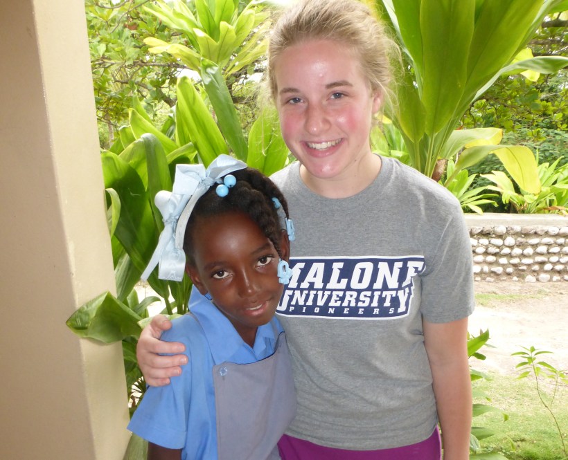 Natalie meeting her family's sponsored child, Jenny, for the first time!