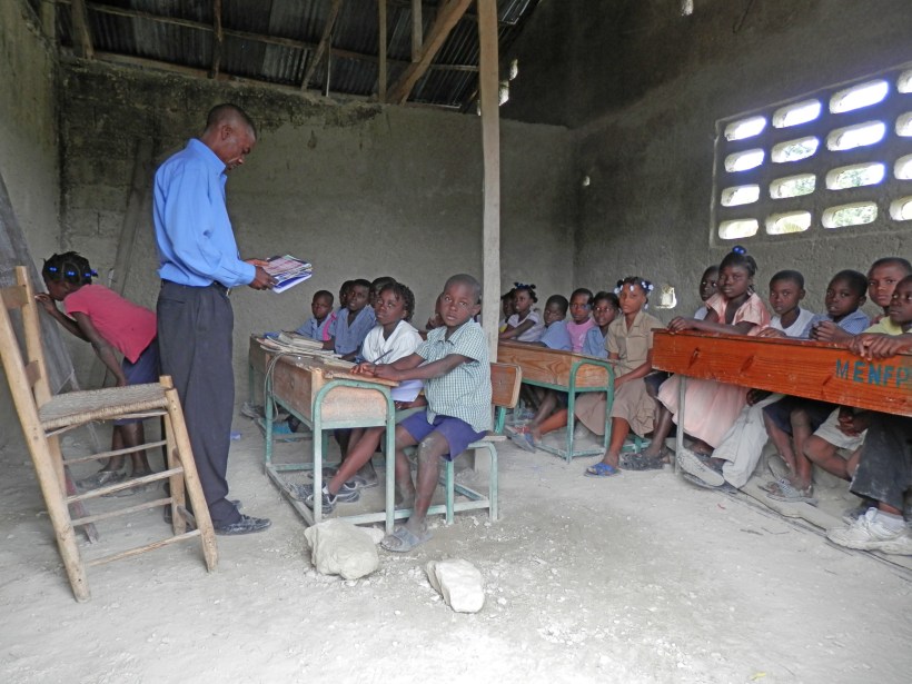A typical Haitian classroom. With lack of books, lessons for the most part are memorization by loud group participation