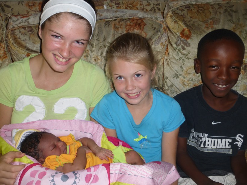 The baby was still to exhausted to care who was holding her!