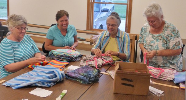 Time and talents are poured into making beautiful pillowcase dresses!