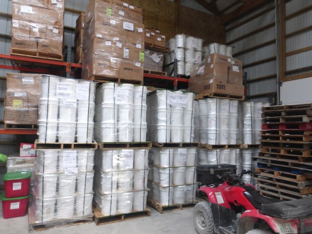 Our section of the storage depot is quite full right now! Buckets of food, boxes of school kits, soap and story book