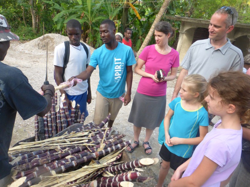 While walking through a local village, we stopped to taste sugarcane, which the seller cut on the spot!