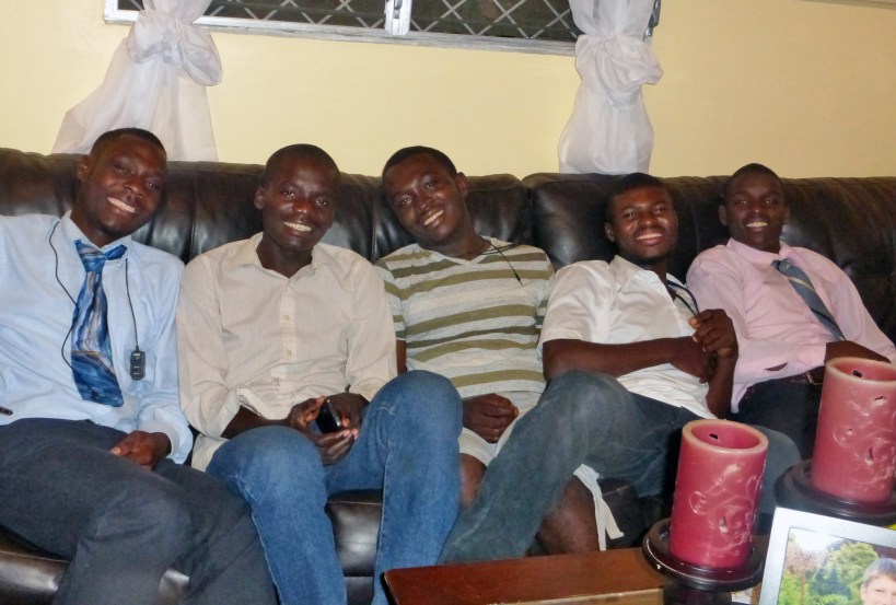 I always think the skin color of these boys makes them disappear into the black couch!