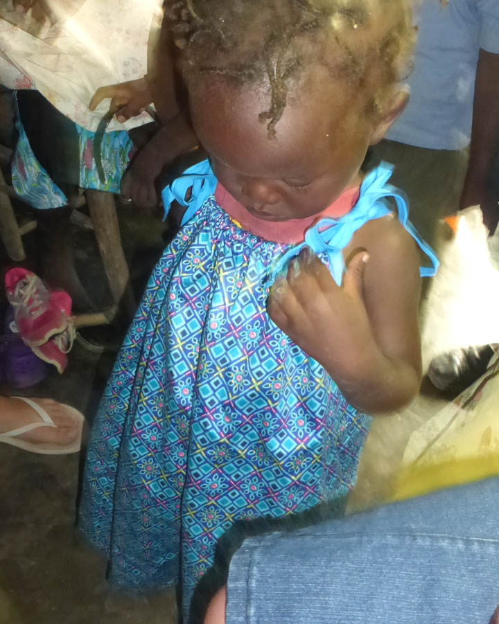 The little girl was so amazed about her new dress!