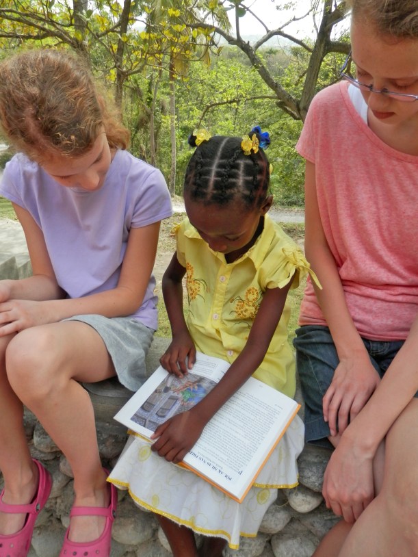 Jolly Sophia seemed to really like her new Creole 101 Favorites Story book!