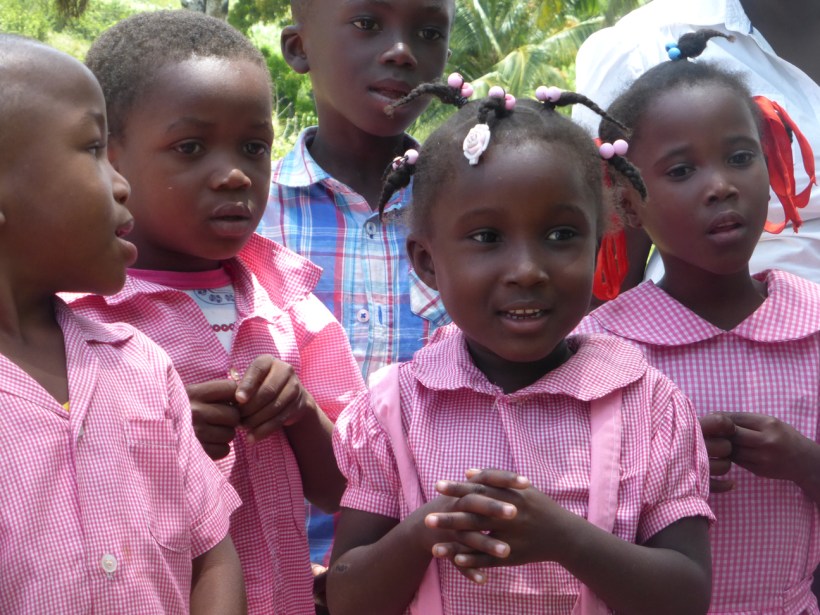 This class sang a song for us and the center girl's innocence caught my eye!