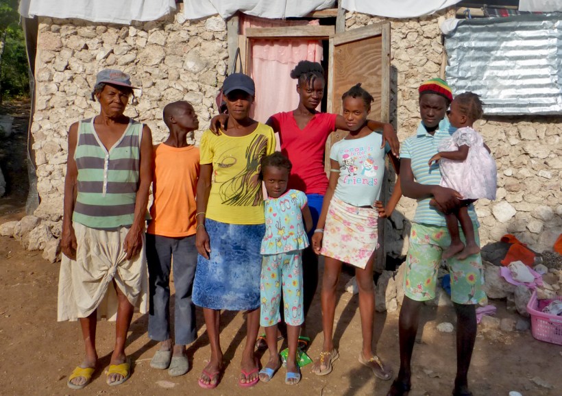 The sponsored child is in the bright red shirt with the rest of her family. Her grandma on the far left. Her 19 year old sister, with her baby, on the far right. 