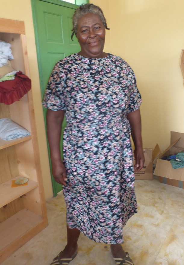 Madame Julien, the cook at the guesthouse, loved the homemade dress. It fit her so well! She was very thankful for it!