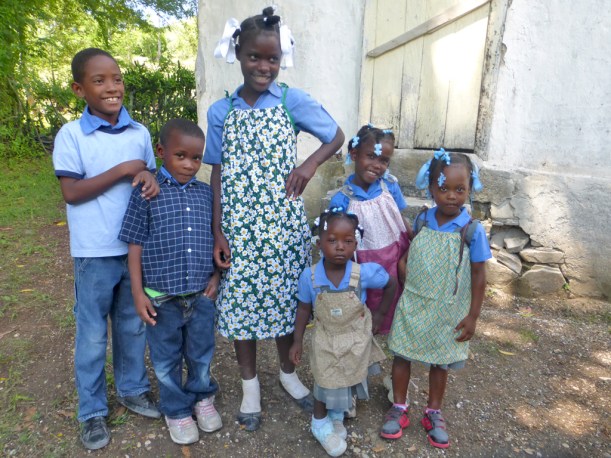 Happy kids modeling their new clothes!