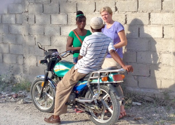It is easy to find taxi drivers with time to spare. Here is our cook, Madam Yadley, sharing the gospel now!