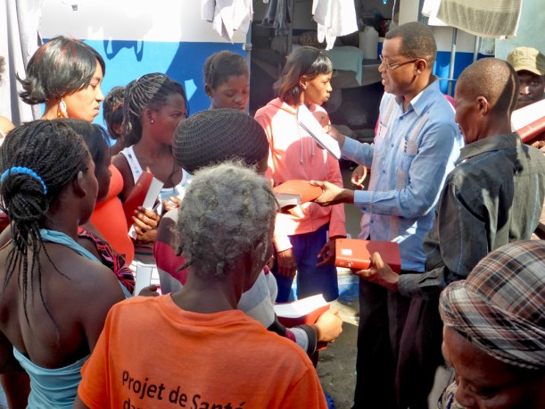 Passing out Bibles and sharing the gospel with prisoners needing new life in Christ.