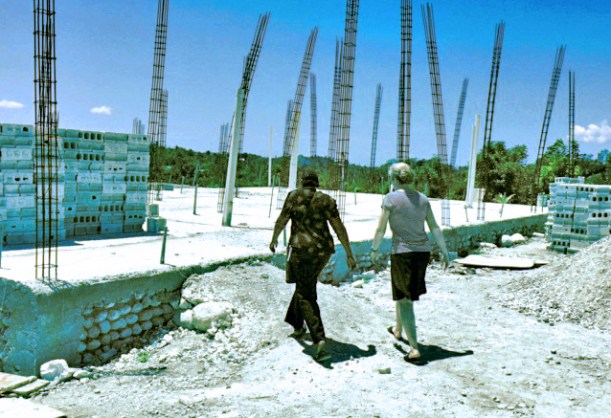 Susie and Adline going to inspect the recent load of block.