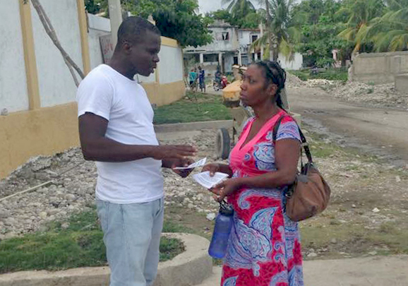 Juslienne, another cooks of ours, sharing the gospel one on one. 