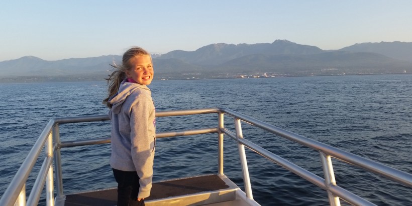 Grace enjoyed the boat ride as we searched for whales!