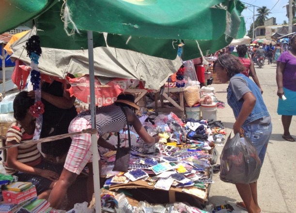 Ricardine is bartering for her school supplies in the streets downtown!