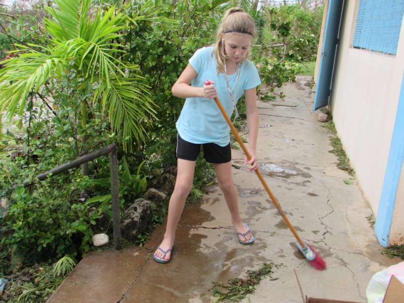 Everyone was needed to help clean up homes, roads, and the school!