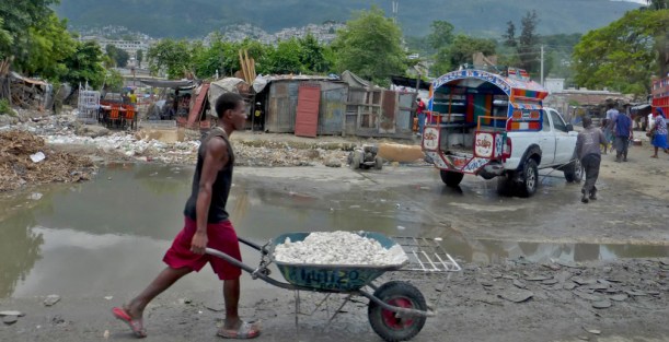 You never usually see the taxis empty here! They are called "tap-taps" because people tap the sides to get off!