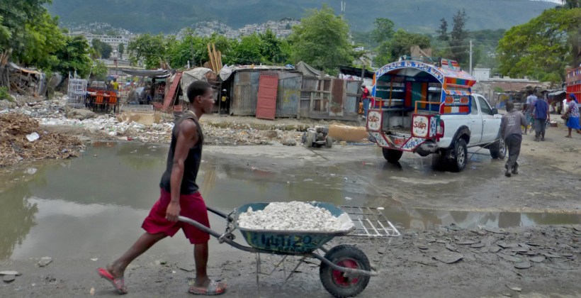 You never usually see the taxis empty here! They are called "tap-taps" because people tap the sides to get off!