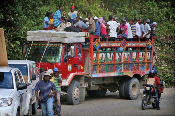 Very few Haitians can afford a car, so they do about anything to get a ride!