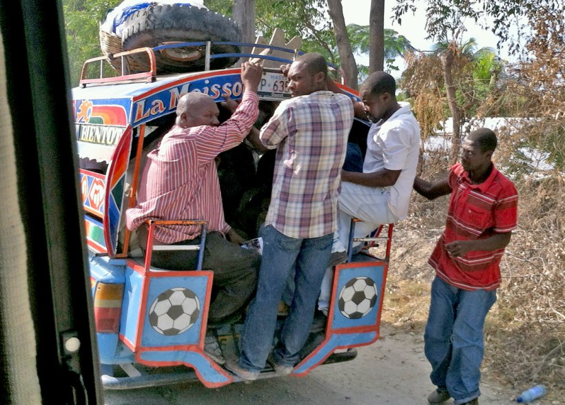 Tap-taps usually don't pull onto the highway until they are jammed full!